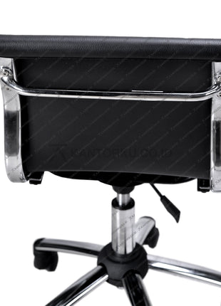 Black office chair with chrome frame on a white background KANTORKU.co.id Solusi Tepat Kebutuhan Kantor Kamu!!