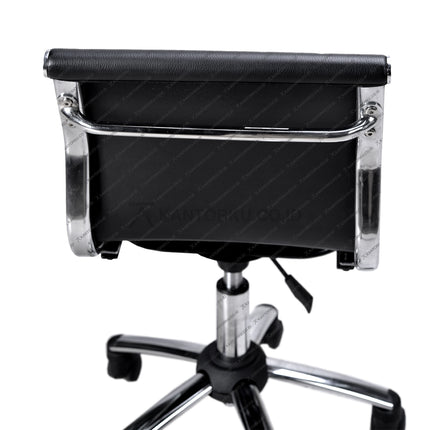 Black office chair with chrome frame on a white background KANTORKU.co.id Solusi Tepat Kebutuhan Kantor Kamu!!