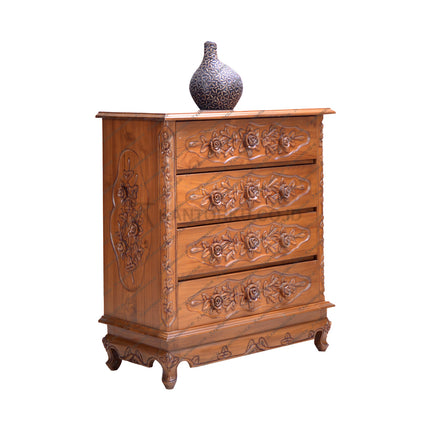 Drawer klasik Jepara dengan ukiran motif bunga dan 4 laci luas, cocok untuk ruang keluarga – kantorkudotcodotid