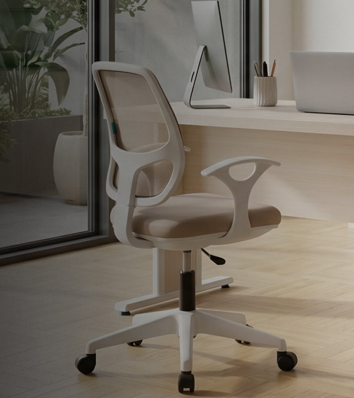 Ergonomic office furniture collection with desk, chair, and bookshelf in a modern office setting.