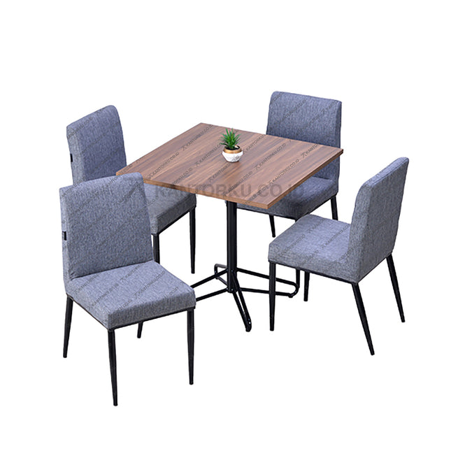 Meja makan persegi bermotif kayu dengan kaki pedestal besi berbentuk bintang elegan — Kantorku.co.id.