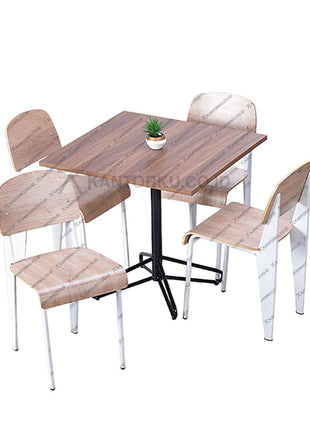 Set meja makan modern dengan meja kaki bintang dan kursi kayu lengkung warna terang — Kantorku.
