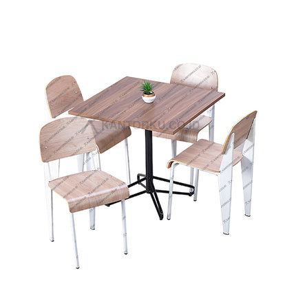 Set meja makan modern dengan meja kaki bintang dan kursi kayu lengkung warna terang — Kantorku.